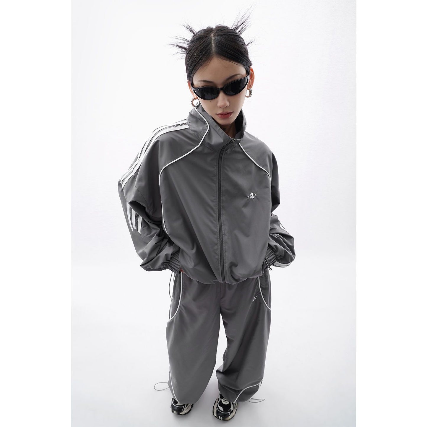 Silver track suit