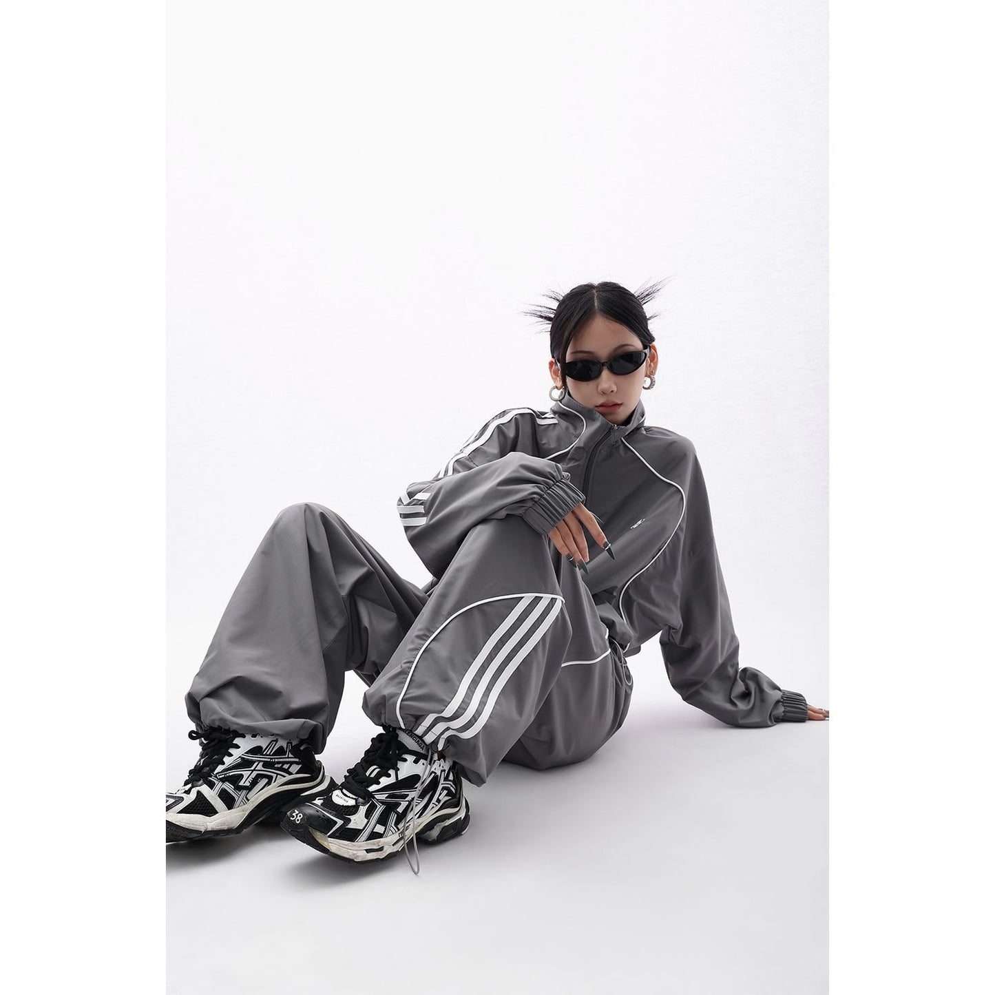 Silver track suit